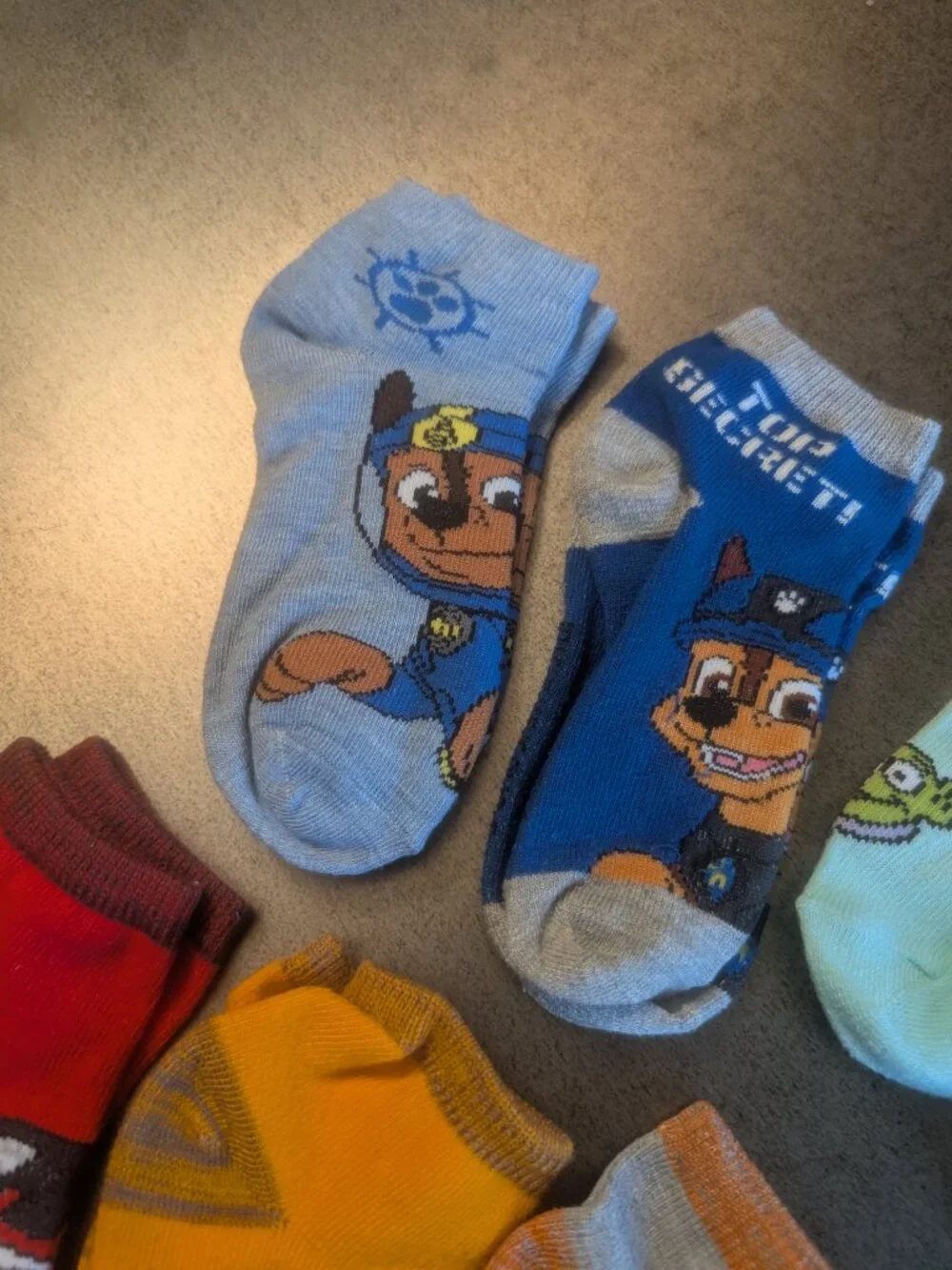 3/$10 - Bundle of 8 Paw Patrol + Toy Story Ankle Socks - M